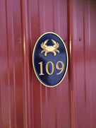 Any color Carved House number with crab (HN1) - The Carving Company front view3