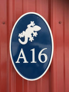 Any color Carved House number with white gecko on navy background