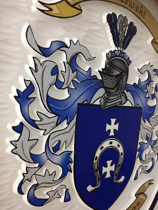 Side view of Baczewski Family crest carved and painted in white and blues