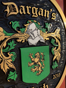 Close up of family crest carved and painted for Dargan family