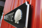 Close up of silver realistic carved scallop shell