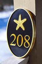 Any color Carved House number with gold starfish on black background side view