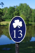 Any color Carved House number with white shamrock on blue background on stake