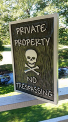Private Property - No Trespassing with skull and cross bones (B66) - The Carving Company