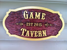 Cedar tavern sign with western font and est date wording Game Tavern