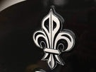 Any color Carved House number with fleur de lis close up