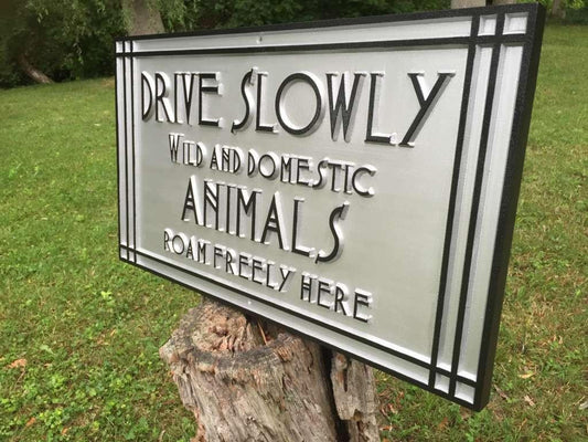 Drive slowly sign