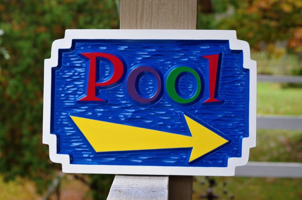 Colorful pool sign with arrow - front view