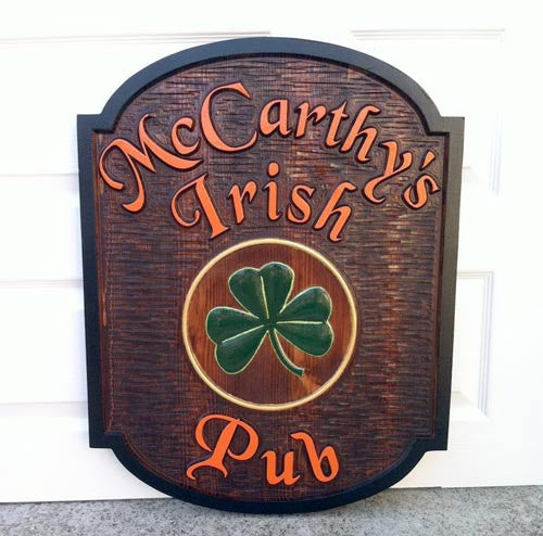 McCarthys Irish Pub stained cedar sign with green shamrock image - front view