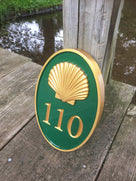 Green and gold House number sign with Realistic Shell (A169)