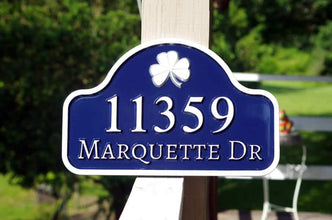arched top house address sign with shamrock