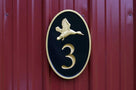 House number sign with 3d flying duck (A169) 