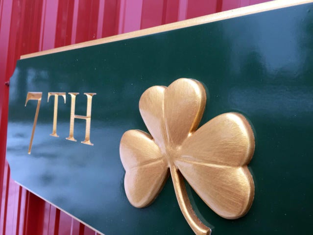 Shamrock on Quarterboard sign painted green and gold