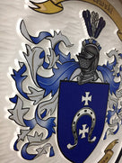 Side view of Baczewski Family crest carved and painted in white and blues