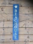 Vertical porch sign with Beach house name carved on it