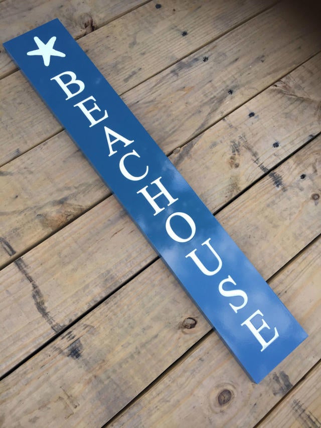 Vertical quarterboard sign for porch painted blue and white