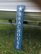 Vertical sign for beach house porch painted blue and white