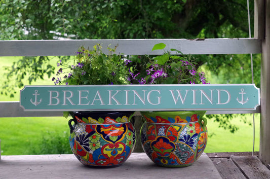 Breaking Wind quarterboard sign