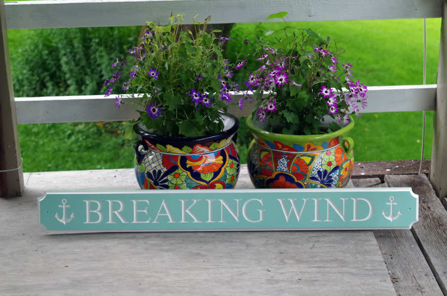 Breaking Wind quarterboard sign painted sea foam green and white