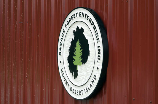 Side view of Tree service business sign round shape