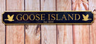 Quarterboard with Goose Island carved on it