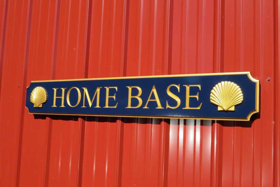 Navy blue and gold custom made quarterboard with realistic shells