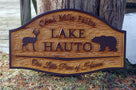 Cedar carved camp sign with buck and bear