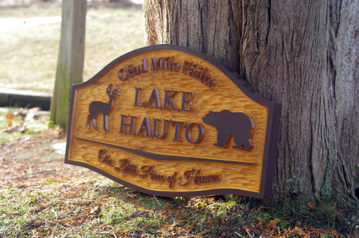 Custom carved Cedar carved camp sign with buck and bear