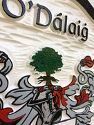 Close up of O-Dalaig family shield custom carved and painted