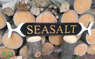 Decorative exterior quarterboard with Seasalt wording and whale tail ends