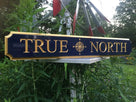 Custom Carved Quarterboard sign with Compass Rose image - Add your name (Q51) - The Carving Company  true north on wagon wheel left side view