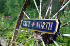 Custom Carved Quarterboard sign with Compass Rose image - Add your name (Q51) - The Carving Company-  true north on wagon wheel side view