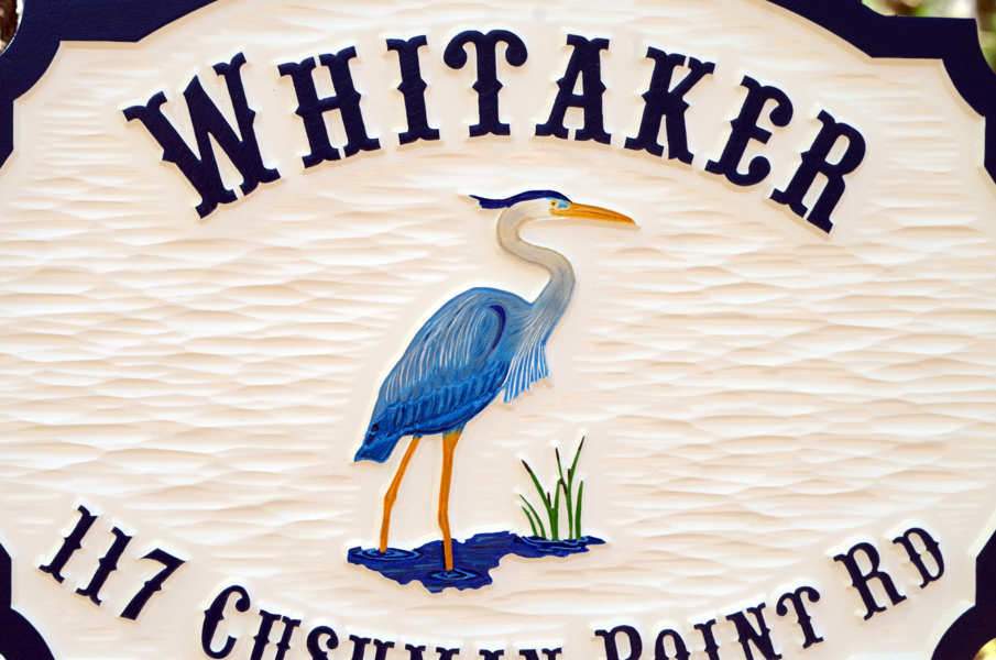 Carved Address plaque with Last Name and blue heron - fron close up (A111) - The Carving Company