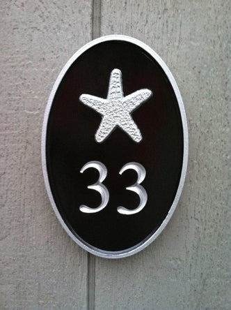 Oval house number sign with starfish beach theme