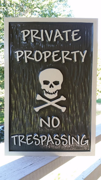 Private Property - No Trespassing with skull and cross bones (B66) - The Carving Company