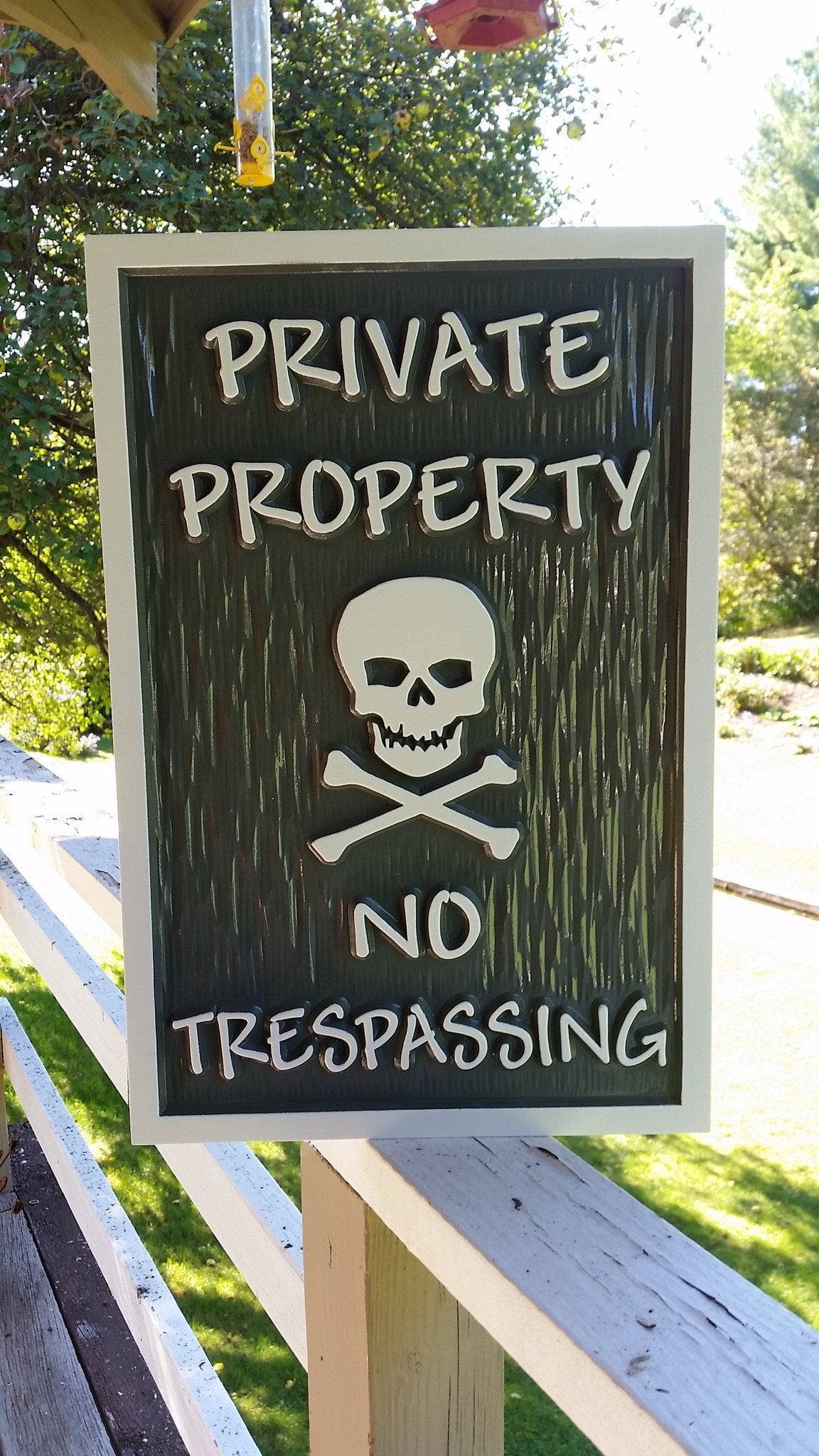 Private Property - No Trespassing with skull and cross bones (B66) - The Carving Company