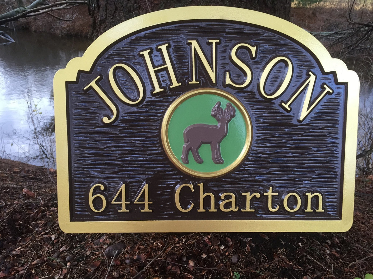 Last name sign with address and deer image