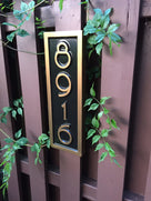 4 digit house number sign with mid century modern font vertical orientation