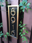 4 digit house number sign with mid century modern art deco font vertical orientation
