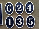 Single digit parking lot marker signs