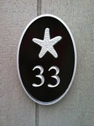 Oval house number sign with starfish 2 digit