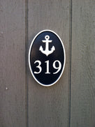 Oval house number sign with anchor 3 digit
