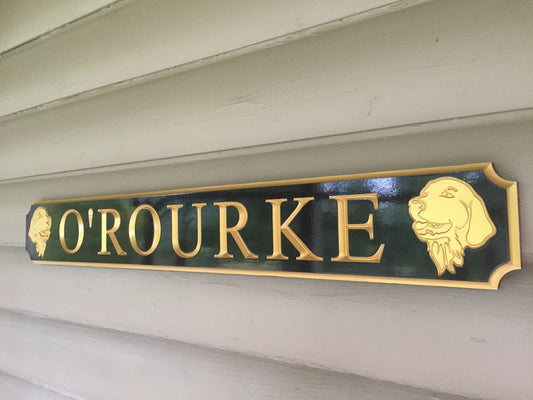 Custom quarterboard with dog breed carved on it