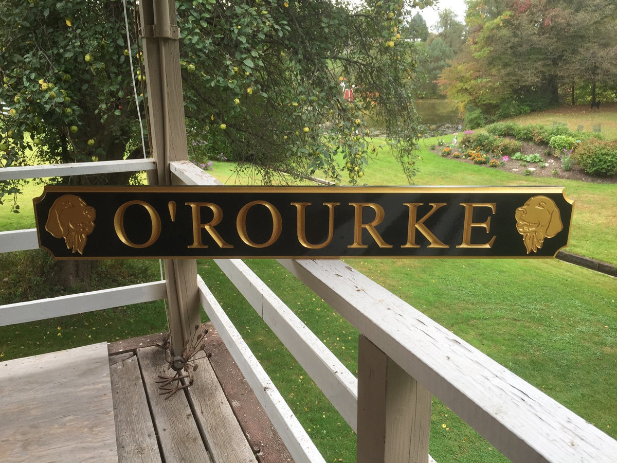 Custom quarterboard with golden retriever carved on it