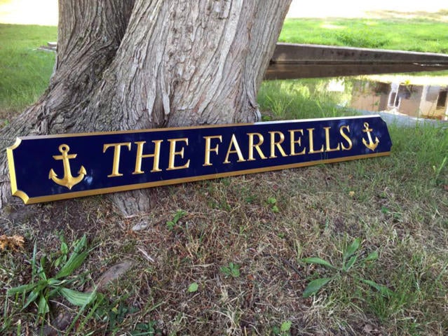 Quarterboard custom made with The Farrells carved on it