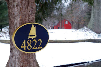 Custom carved house number signs – Tagged