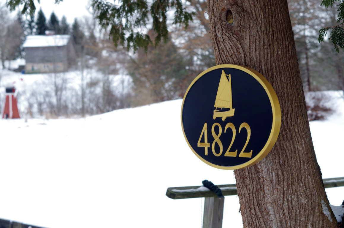 Nautical Carved Street Address plaque / House number with catboat or sailboat (A154) - The Carving Company