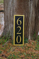 Address sign for house with the number 620 showing