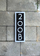 Custom made address number with letter rectangular sign painted black and silver