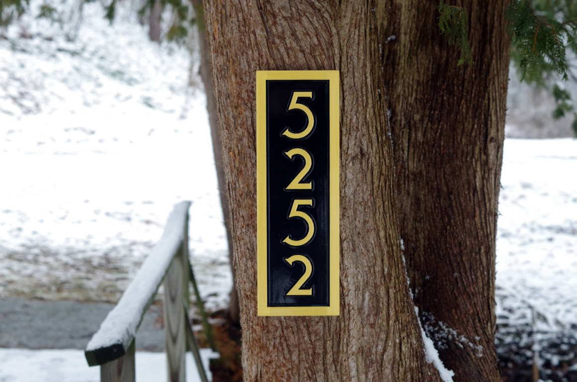 House number sign 5252 in black and gold mid century modern font